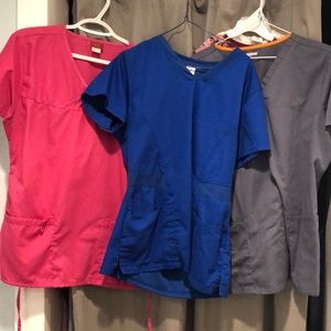 Three scrub tops